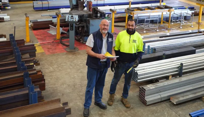 Employees checking stocks in the warehouse