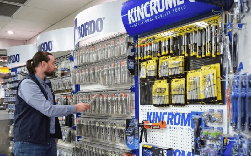 ES - Get quality fasteners today men having shop and getting accessories