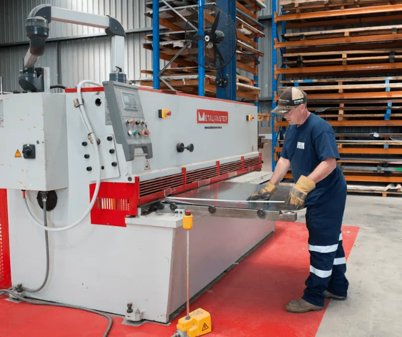 Men standing while working