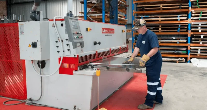 Men standing while working