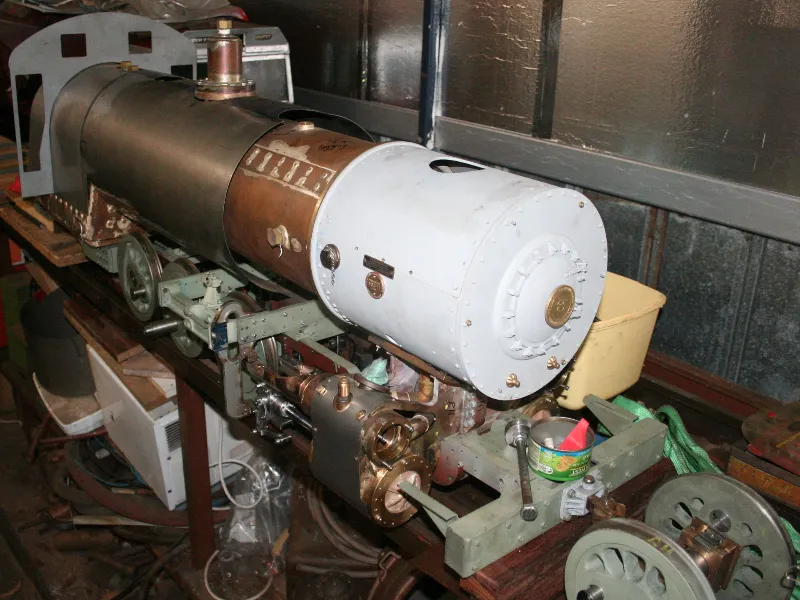 Rear angle of a handcrafted model steam locomotive showing the boiler