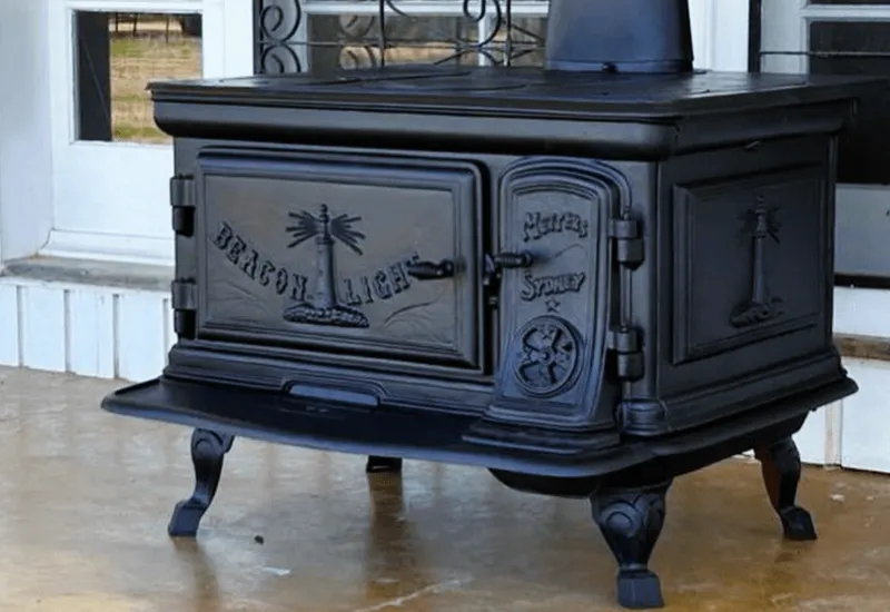 Fully restored black Beacon Light cast iron wood stove on veranda.
